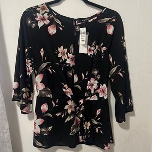 Brand is sugar lips , Blouse Size Med . Black with pink and white flower prints